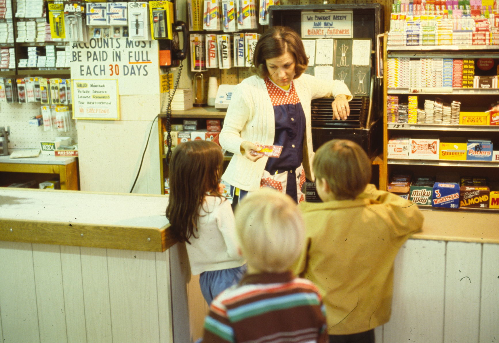 Children buying candy at 10th Avenue Grocery
